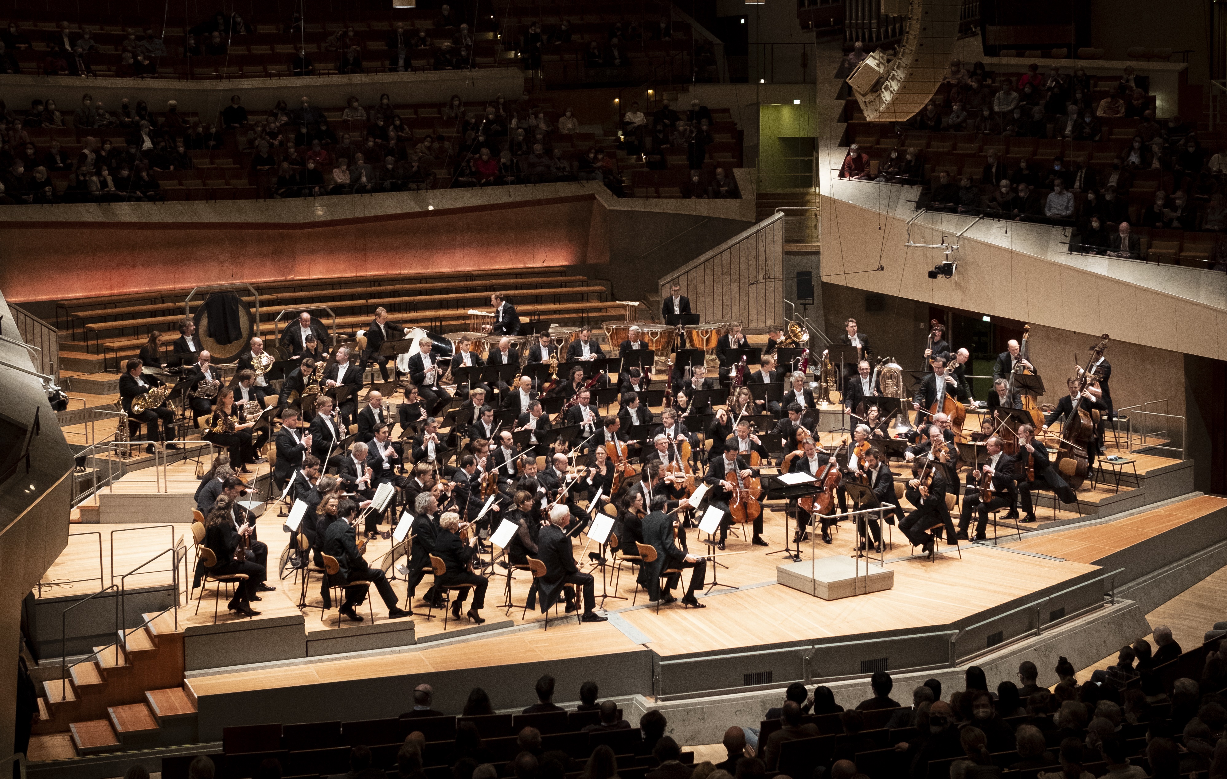 Orchestra on stage at the Philharmonie Berlin